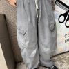 灰色刷髒彎刀風褲